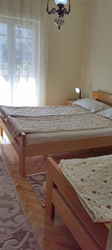 Postel nebo postele na pokoji v ubytování Apartman Vesna