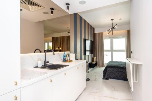 Katil atau katil-katil dalam bilik di Super-Apartamenty VIP Jacuzzi III