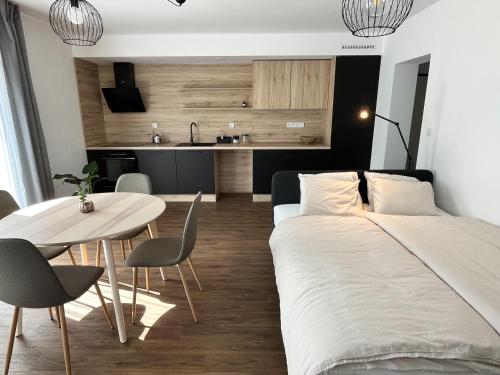 Sáňky Apartmányにあるベッド
