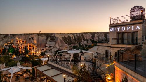 a view of a resort with a mountain in the background at Utopia Cave Cappadocia in Urgup