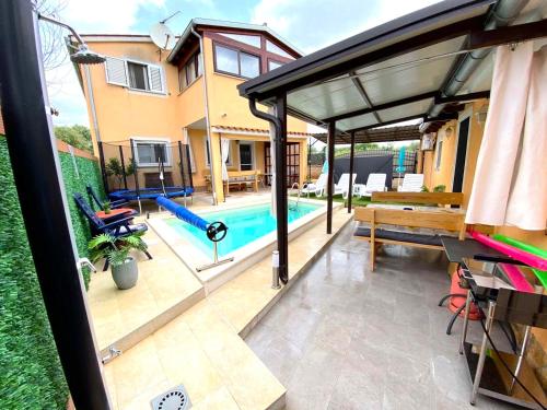 Kuća za odmor Manuela & Andrea - grijani bazen