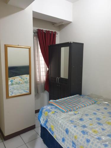 Postel nebo postele na pokoji v ubytování Apartement Buah Batu Park