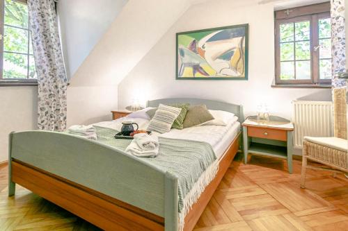 Una cama o camas en una habitación de Willa DanSar