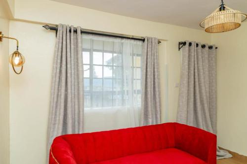 Posezení v ubytování Bahati Cozy Homes
