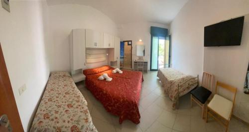 Postel nebo postele na pokoji v ubytování Hotel Silvaion
