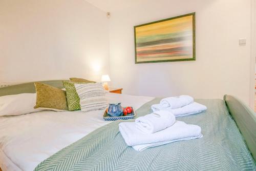 Una cama o camas en una habitación de Willa DanSar
