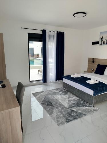 Postel nebo postele na pokoji v ubytování Apartman Vito