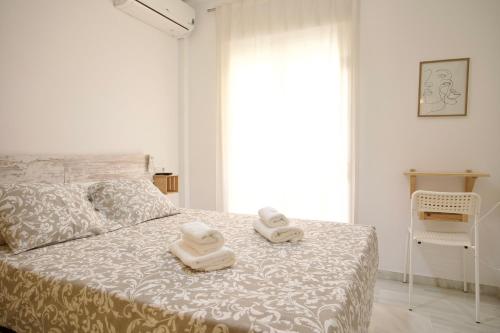 Posteľ alebo postele v izbe v ubytovaní Bonito apartamento cerca de la playa de Torrox