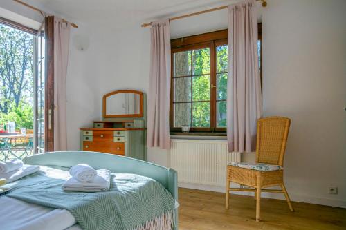 Una cama o camas en una habitación de Willa DanSar