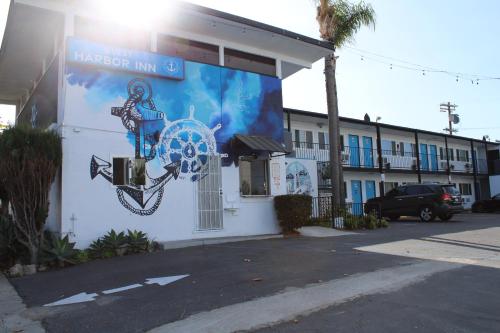 a building with a mural on the side of it at Guest Harbor Inn- Port Of Los Angeles San Pedro in San Pedro