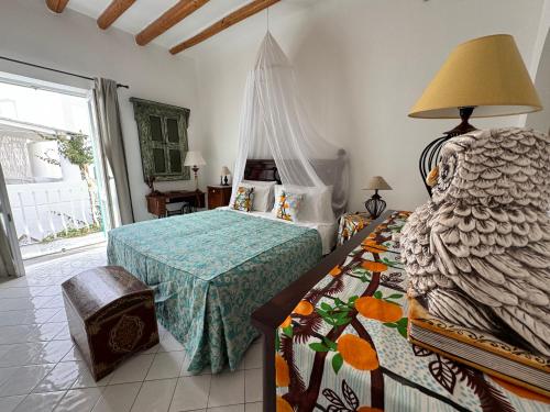 A bed or beds in a room at Hotel Lisca Bianca