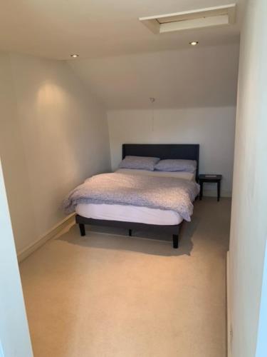 a small bedroom with a bed in a room at Holiday Home in Kidderminster in Kidderminster