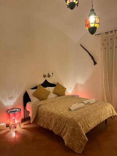 CK Rooms tesisinde bir odada yatak veya yataklar
