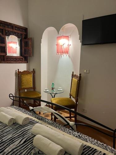 CK Rooms tesisinde bir televizyon ve/veya eğlence merkezi