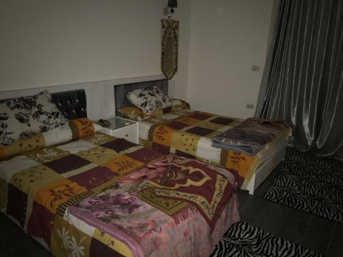 Postel nebo postele na pokoji v ubytování Senior ch. hacienda bay