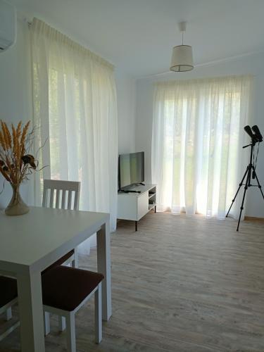 TV a/nebo společenská místnost v ubytování Greci GuestHouse