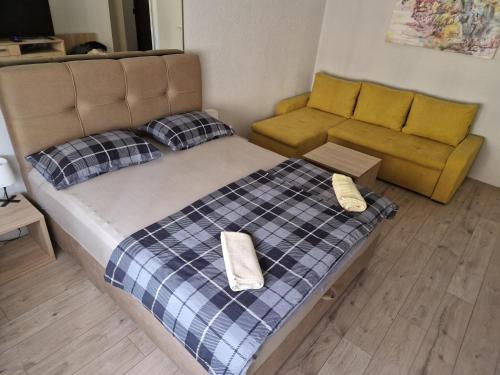 Postel nebo postele na pokoji v ubytování Apartment Downtown