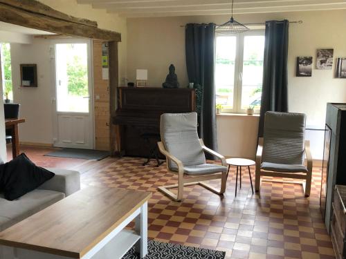 Χώρος καθιστικού στο Gîte aux ânes avec Spa