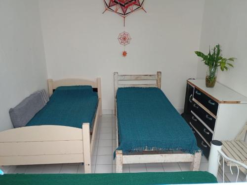 Llit o llits en una habitació de Muhana Domus