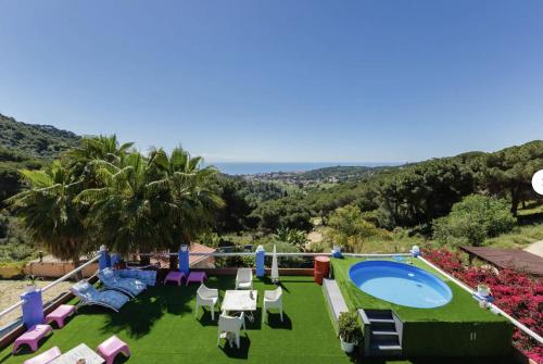 arial view of a resort with a swimming pool at Casa Miramiranda in Teià