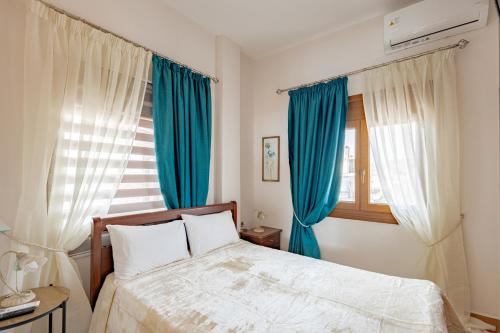 Giường trong phòng chung tại Villa Chara