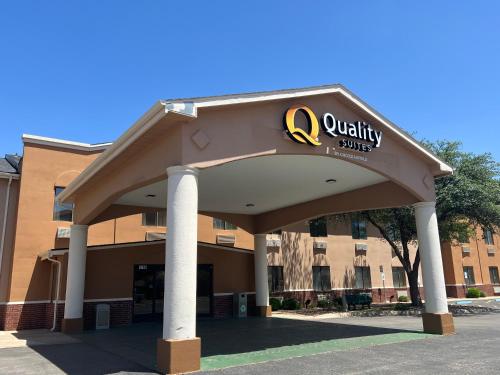 a view of a building with a quality clinic sign on it at Quality Suites Midland North Loop 250 in Midland