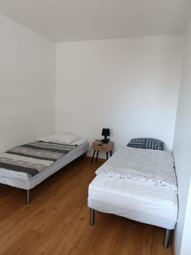 Postel nebo postele na pokoji v ubytování Pokoje w Bytowie