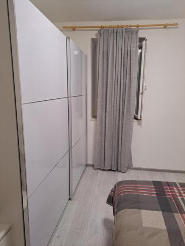 Katil atau katil-katil dalam bilik di Stone Guest House