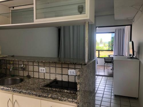 Kuchyň nebo kuchyňský kout v ubytování Studio Flat Gavoa Resort - Vista incrível de Itamaracá