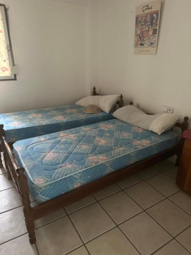 Кровать или кровати в номере Habitación Yailin