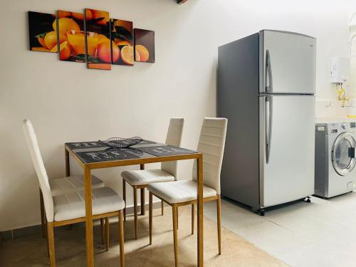Η κουζίνα ή μικρή κουζίνα στο Hermoso apartamento con estacionamiento