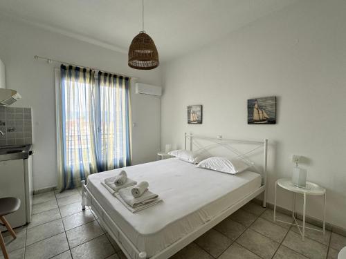 Un pat sau paturi într-o cameră la Eviamar