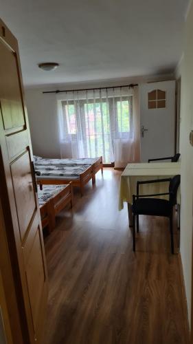 Postel nebo postele na pokoji v ubytování Chata u Żaby