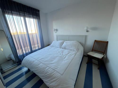 Postel nebo postele na pokoji v ubytování Belle Villa à Leucate résidence naturiste 6pers 3 chambres