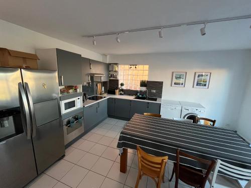 Kuchyň nebo kuchyňský kout v ubytování Belle Villa à Leucate résidence naturiste 6pers 3 chambres