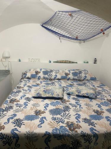 En eller flere senge i et værelse på Casa vacanza nina