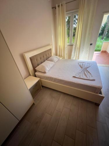 Postel nebo postele na pokoji v ubytování Marika Apart Hotel