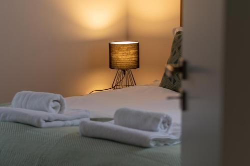 Katil atau katil-katil dalam bilik di River House Spa Jacuzzi Sauna
