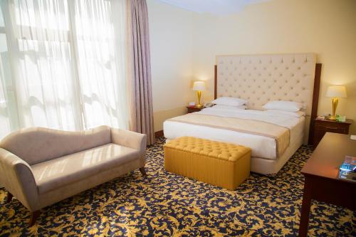 Katil atau katil-katil dalam bilik di Ramada by Wyndham Almaty