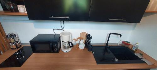 Dapur atau dapur kecil di Le Ptit Gibs