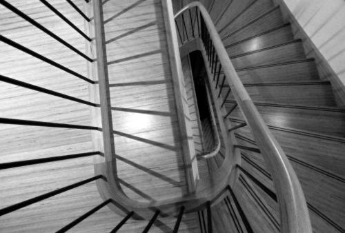 a stairway with a bench in a building at Beau Rivage in Charavines