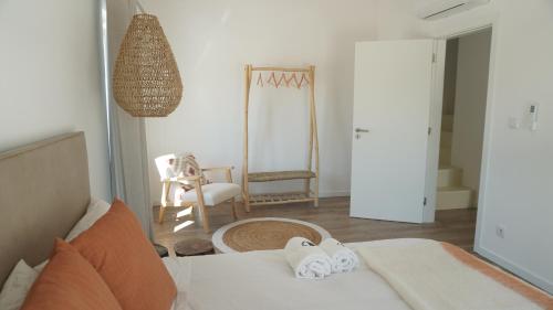 Postel nebo postele na pokoji v ubytování Quinta das Cestas - Agroturismo