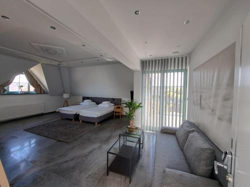 Una cama o camas en una habitación de Tulipan