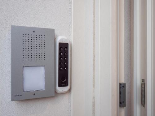 a remote control is attached to a door at LA NICCHIA in Cesena