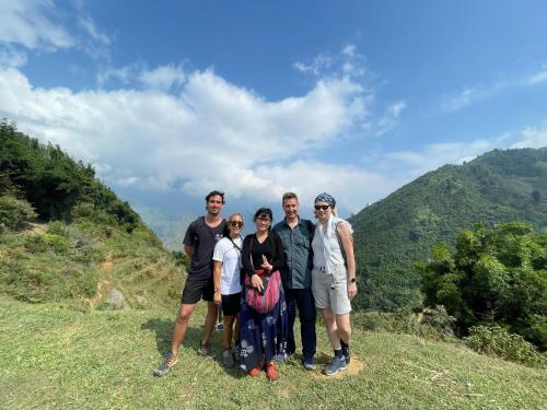 a group of people standing on top of a hill at Surelee Homestay in Sa Pa