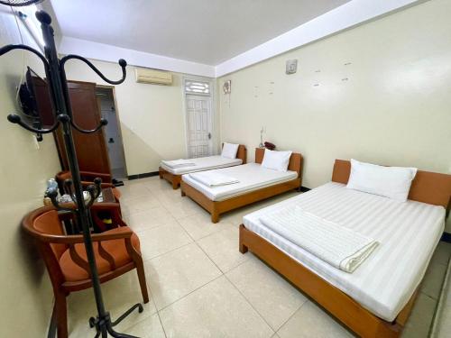 Postel nebo postele na pokoji v ubytování Hương Trà 2