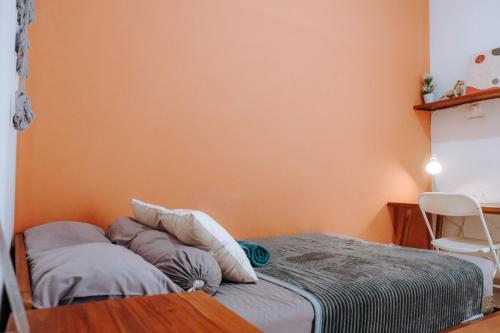 Ένα ή περισσότερα κρεβάτια σε δωμάτιο στο BYTE Bed and Breakfast