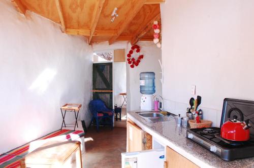 Atacama Loft & Glampにあるキッチンまたは簡易キッチン