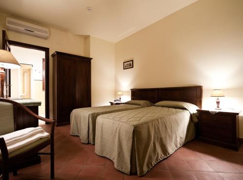 Postel nebo postele na pokoji v ubytování La Terra Del Mezzo
