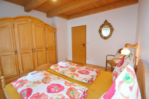 Una cama o camas en una habitación de 'Kampm'blick